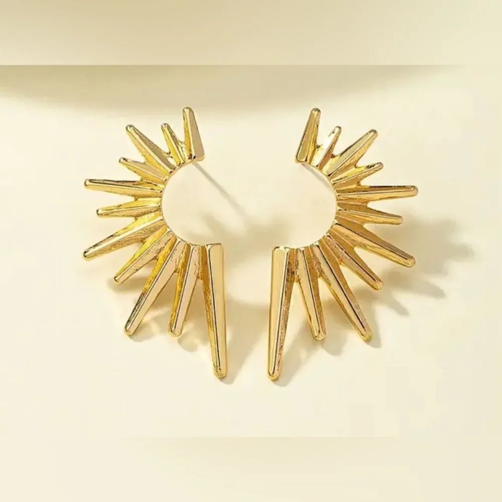 Sun radiant earrings N952